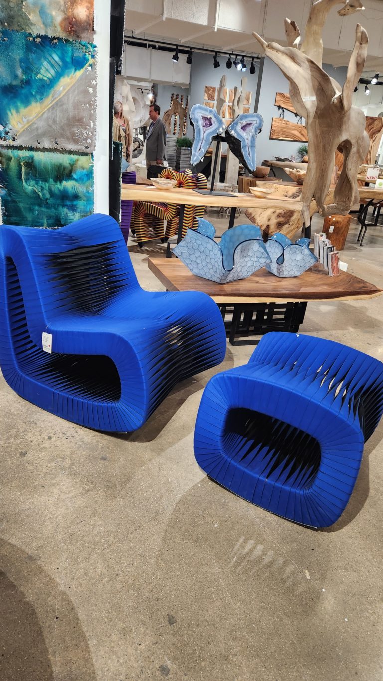 A blue Seatbelt Chair from Phillips Collection
