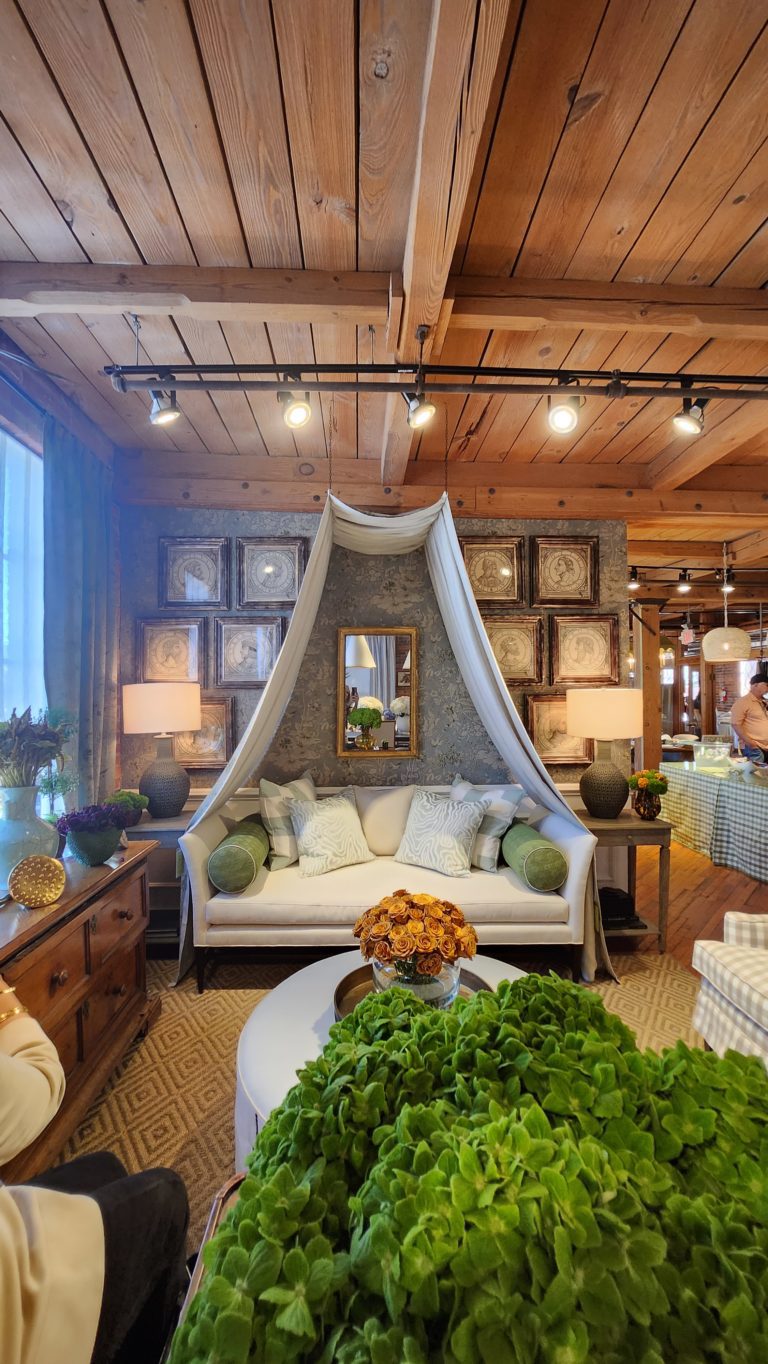 Rustic showroom with a tented couch