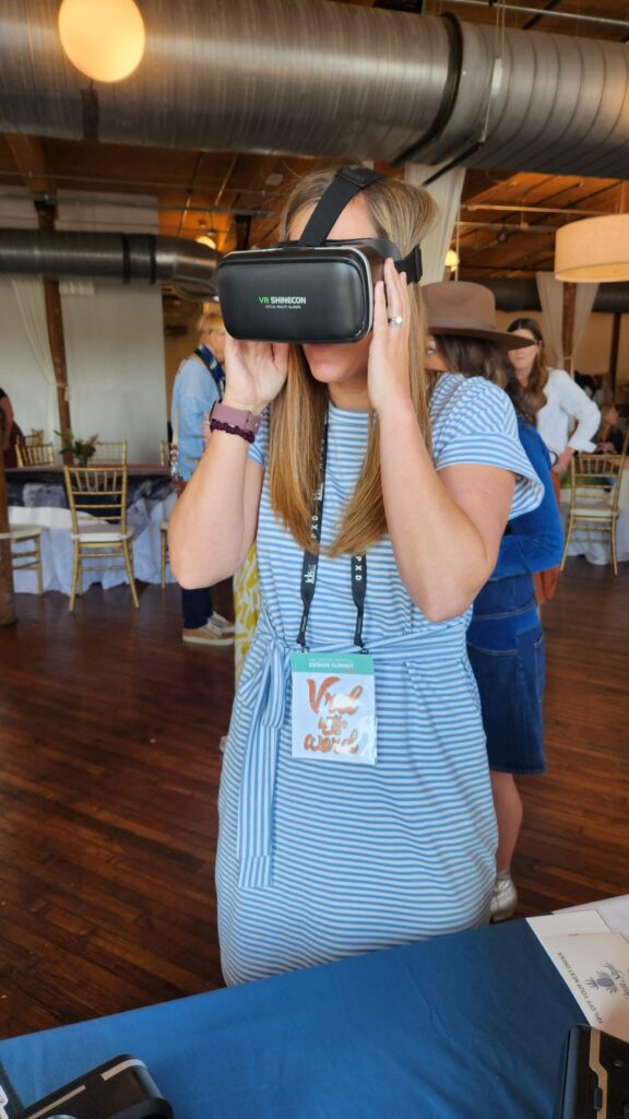 Designer trying a VR tour at the Vacation Rental Design Summit